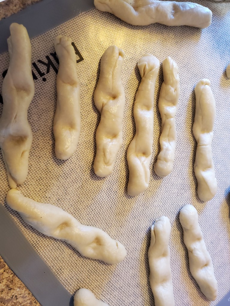 Dough Snakes with Knuckles Pressed In